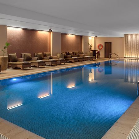 Doubletree By Hilton La Torre Golf Resort Roldan Ngoại thất bức ảnh The swimming pool at the hotel