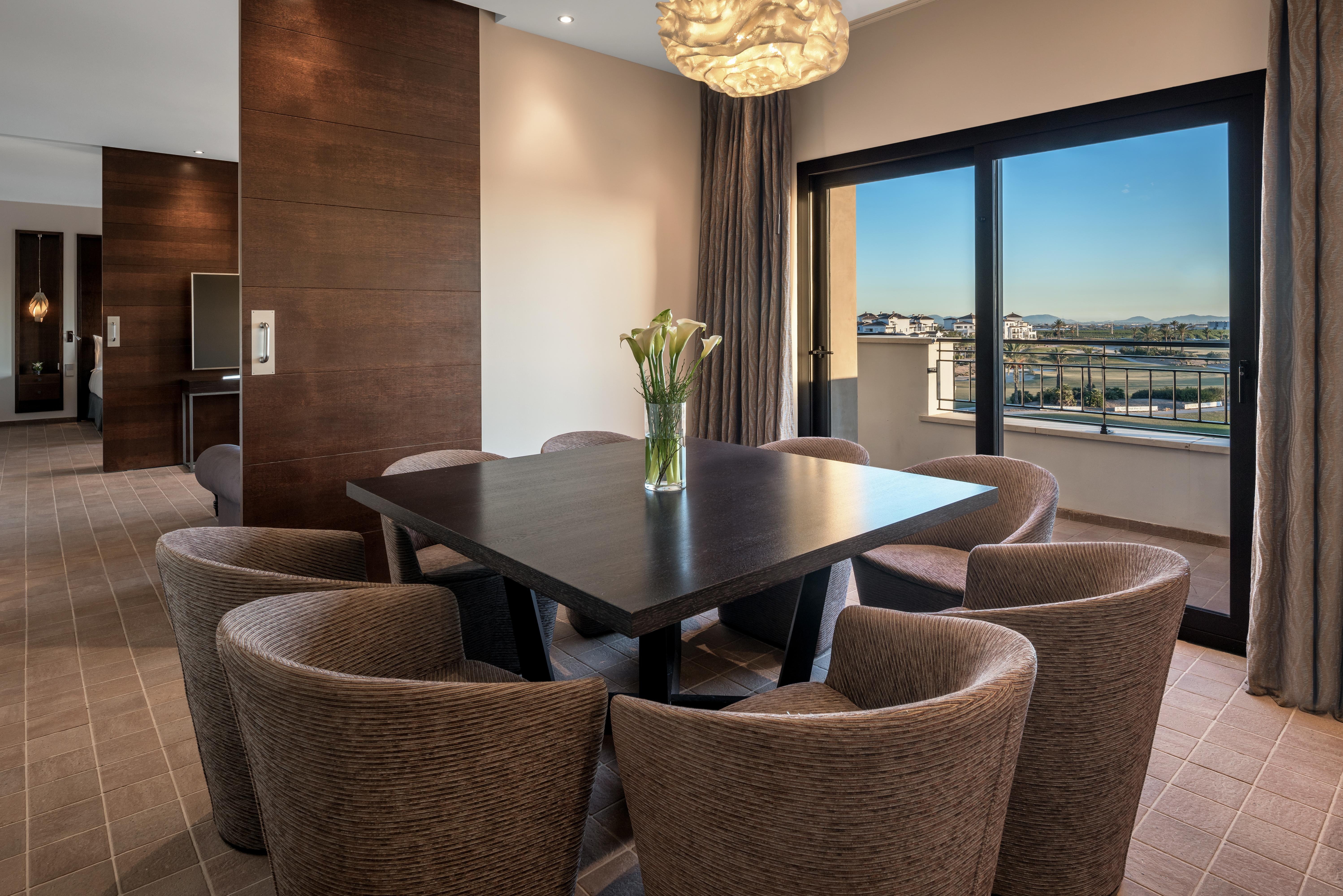 Doubletree By Hilton La Torre Golf Resort Roldan Ngoại thất bức ảnh A suite at the Hilton Athens