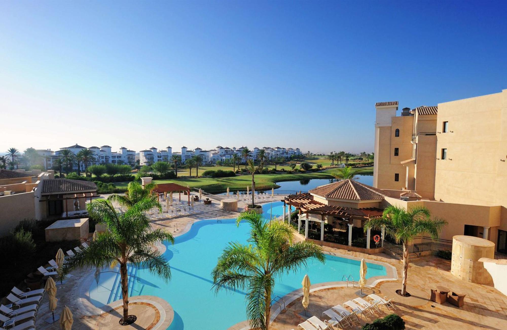 Doubletree By Hilton La Torre Golf Resort Roldan Ngoại thất bức ảnh View of the pool at the clubhouse