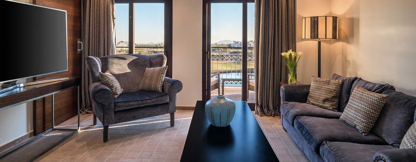 Doubletree By Hilton La Torre Golf Resort Roldan Ngoại thất bức ảnh A suite at the hotel